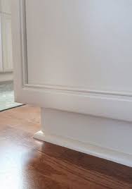 Kitchen Cabinets Chipped Or Baseboards Peeling Here S What To Do Baseboards Tile Baseboard Kitchen Cabinets
