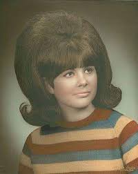 Who remembers when you had this hair style in the 60's It was the higher  the better with a half can of Aqua Net here lol.