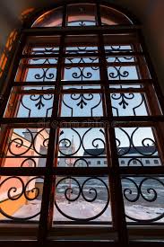 With charming small floral iron motifs and a wonderful patina the original spanish metalwork. 132 Antique Window Wrought Iron Grille Photos Free Royalty Free Stock Photos From Dreamstime
