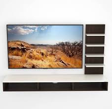 Many of us choose to have a tv installed in the bedroom distinct from the family entertainment centre or living room. Tv Units Designs Buy Tv Stand Cabinets Tv Table Online From Rs 2490 On Online In India Flipkart Com