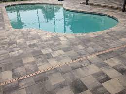 Our pavers allows for easy placement of outdoor furniture, grilling equipment, and more. Pool Pavers Provide Valrico Homeowners Dazzling New Pool Decks Bay Brick Pavers
