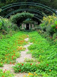 Monet S House At The End Of A Flower Filled Pathway In Giverny France Monet Garden Giverny Giverny France Giverny Monet