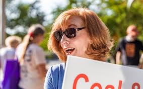 Lawrence rally calls for Evergy to close coal-fired plant