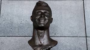 Cristiano ronaldo's bronze statue stands outside his cr7 museum in his hometown of funchal on the inside ronaldo's museum also stands a wax statue of the real madrid player. Mocked Cristiano Ronaldo Statue Removed From Airport Itv News