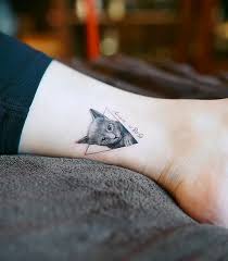See a recent post on tumblr from @linipik about cat tattoo. Cattoos