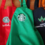 Red apron Starbucks from www.delish.com