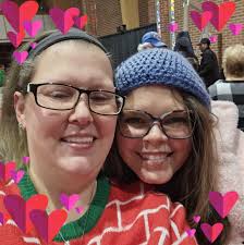 Violinist performing in Kroger parking lot