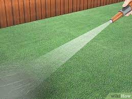 Grasses with some sand, rubber or ash type backings and infill can sometimes trap waste. 3 Ways To Clean Dog Urine Out Of Artificial Grass Wikihow