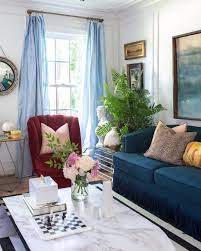 Jewel Tones Paired With White Walls And Those Baby Blue Curtains Jeweled Interiors Blue Living Room Decor Blue Living Room Light Blue Living Room