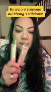 Girl Eats Raw Sausage