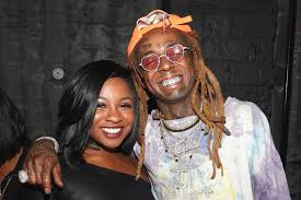 Lil wayne, whose real name is dwayne carter, landed at the miami airport on a private jet lil wayne is expected to be pardoned by president donald trump before he leaves office on wednesday. Lil Wayne S Daughter Reginae Carter Is Latest Savage X Fenty Lingerie Ambassador