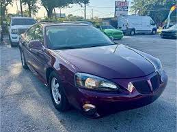 Image result for Red Brown 2004 Pontiac