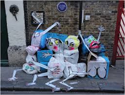 Artist Turns London's Garbage Piles Into Bizarre Monsters - Bloomberg