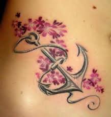 Symbolically, an anchor signifies the determination to withstand any circumstance of life. 2014sports Net Anchor And Flower Tattoo Designs Tattoos At Repinned Net