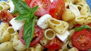 Rotini Pasta Is Tossed With Pesto Fresh Mozzarella And Tomatoes For A Colorful Pasta Version Of Caprese Sala Caprese Pasta Caprese Salad Caprese Salad Recipe