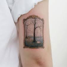 The most common placement are thighs, ribs, back, and chest. Framed Landscape Tattoo On The Back Of The Right Arm