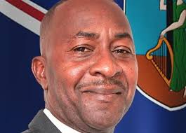 Opposition member sits