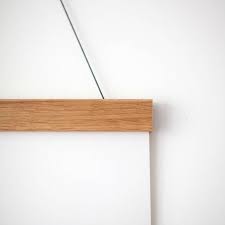 How big is a 10 piece picture frame? Wooden Picture Hanging Frame By Karin Akesson Design Notonthehighstreet Com