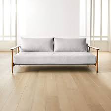 The thelma sleeper sofa sectional features a pull out bed in gray microfiber. Una Grey Sleeper Sofa Reviews Cb2