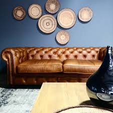 Buy modern chesterfield sofa online in london & across uk from denelli italia store. The Cotton Mill Our Chesterfield Sofa Currently On Our Showroom Floor Is This Wonderful Rich Leather Chesterfield Sofa It S Color Pops Against The Midnight Blue Gray Wall The Deep Buttons