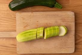 A long, thin vegetable with a dark green skin. How Long Does Zucchini Last How Do You Store It Does It Go Bad