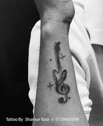 If you are looking for a small tattoo then look no further than this one. Shankar Badi Gensteve Guitar Tattoo Tattoo Small Facebook
