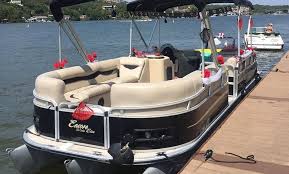I'd like you to compare two of the pictures and say what might be the challenges that people face while working and whether they enjoy what they do. Austin Rental Boats Austin Rental Boats Groupon