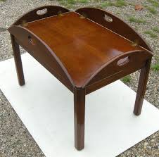 Butler vasco collection 0286070 48 coffee table with clock inset, beveled edge glass top, traditional style, square shape, resin material and leather upholstery in heritage finish butler 0286070 butler vasco collection 0286. Vintage Biggs Mahogany Butler Table By Buyadalia On Etsy 199 00 Butler Table Table Formal Living Rooms