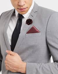 Where does it come from, how to wear it. Gianni Feraud Plain Floral Lapel Pin With Pocket Square Asos
