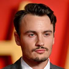 Brandon Thomas Lee: Short Quiff Hairstyle With Severe Side Part