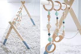 Neben dem spielbogen aus holz für die krabbeldecke gibt es auch die spielbogen anhänger für den kinderwagen. Anleitung Fur Einen Baby Spielbogen Aus Holz Besonderes Geschenk Zur Geburt Selber Machen Werbung Babyeckchen Mama Blog