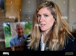 Caroline Jolivet, grand-daughter of late Jewish French-American World War  II veteran Bernard Dargols, attends his funeral ceremony at Pere Lachaise  cemetary in Paris Thursday, May 9, 2019 in Paris. Dargols waded onto