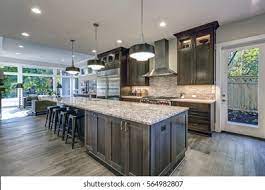 Maybe you would like to learn more about one of these? Modern Kitchen Brown Kitchen Cabinets Oversized Stock Photo Edit Now 564982807