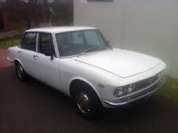 Image result for Mars Red 1969 Mazda