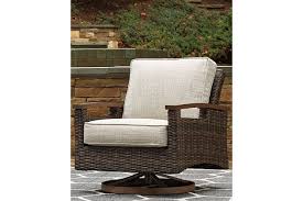 Gray rapallo outdoor lounge chair wood rope outdoor lounge chair gray rapallo outdoor lounge chair world market best outdoor lounge chairs 2020 1001 gardens relax with the. Paradise Trail Outdoor Swivel Lounge Chair 2 Count Ashley Furniture Homestore