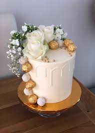 Black And Gold Drip Cake With Flowers White And Gold Drip Cake With Fresh Flowers Fresh Flower Cake Drip Cakes Flower Cake