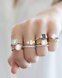 Why Wear One Custom Engagement Ring When You Can Wear Six Plus Some Wedding Bands Side Stone Engagement Ring Stone Engagement Rings Diamond Wedding Bands