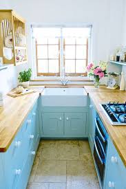 What Color To Paint A Small Kitchen To Make It Look Bigger Small Kitchen Decor Small Space Kitchen Tiny House Kitchen