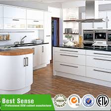 After we moved into our house, we had a small housewarming party. China Elegant White Uv High Gloss Kitchen Cabinet With Island Table China High Gloss Kitchen Cabinet Modular Kitchen Cabinets