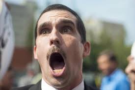 Kentucky Clerk Kim Davis says God is her boss while bearing giant cross