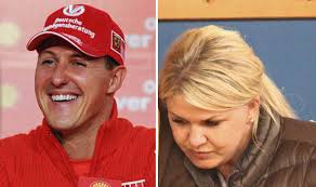 But devoted wife corinna schumacher claims she is. Michael Schumacher S Wife Smiles As She Is Spotted In Public For The First Time In Months World News Express Co Uk