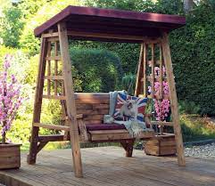 The canopy water resistant swing seat cover is ideal for use in moderate weather conditions. Charles Taylor Dorset Burgundy 2 Seater Swing Seat Gardensite Co Uk