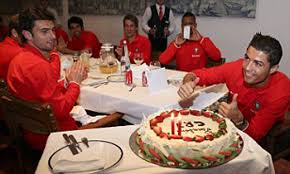 Cristiano ronaldo of portugal peeks through some paper as he poses for a portrait during an official fifa world cup 2018 portrait session. Cristiano Ronaldo Has Massive Birthday Cake Daily Mail Online