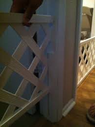 A diy pet gate can be made with just about any type of wood. Easy Diy Dog Gate Lattice Work And Apply A Piace Of Wood To The Door So It Slides Up And Down Diy Dog Gate Dog Gate Pet Gate
