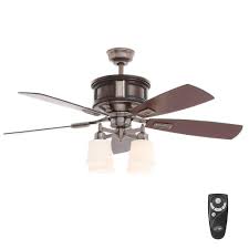 This remote is designed to control up to 16 fans using 16 separate code frequencies up to a range of 30 ft. Hampton Bay Garrison 52 In Indoor Gunmetal Ceiling Fan With Light Kit And Remote Control Ac438 Gm The Home Depot Ceiling Fan With Light Ceiling Fan Light Kit Ceiling Fan Light Fixtures