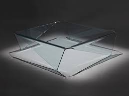 The smart coffee table fridge automatically opens up to reveal a large cooled area inside the table. Modern Coffee Table Futuristic Design