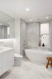 White And Gray Chevron Tiling Modern White Bathroom Sleek Bathroom Modern Bathroom