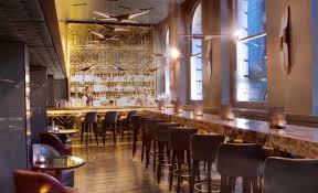 Simple square wood blocks have replaced shelving on walls and gave a character to the. Modern Interior Design Restaurant Bar Furniture