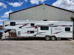 The work and play is the perfect cargo carrier with living quarters for you to get out and enjoy the great outdoors (make sure to bring your toys with. 2014 Forest River Work And Play Wpf34rls Toy Haulers 5th Wheels Rv For Sale By Owner In Delta Ohio Rvt Com 430779