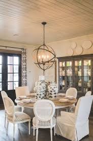 Modern Farmhouse Dining Room With Round Wooden Table And Round Cai In 2020 Modern Farmhouse Dining Room Farmhouse Dining Rooms Decor Modern Farmhouse Dining Room Decor